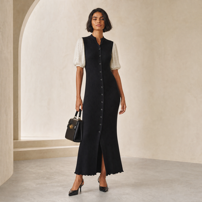 Selene Knit Maxi — hero shot, fitted black ribbed knit with contrast ivory sleeves