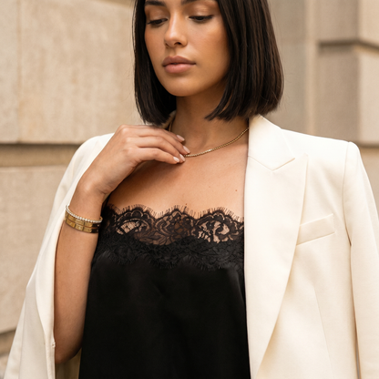 Saga Lace Cami — on-model neckline detail with cream blazer layered over