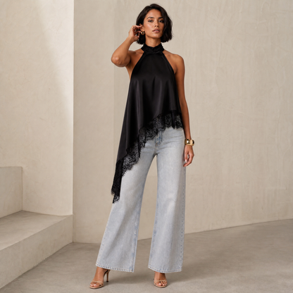 Vega Halter Top in Black — hero styled with light wash denim