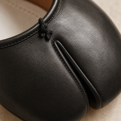 Iris Tabi Flat — macro split-toe construction detail