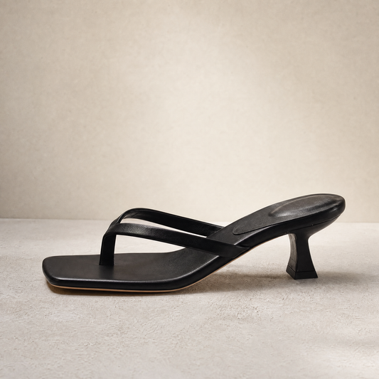 Sigrid Thong Sandal in Black — side profile product shot