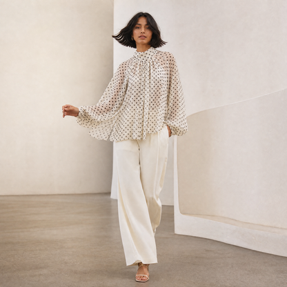 Ingrid Polka Blouse — movement with balloon sleeves flowing
